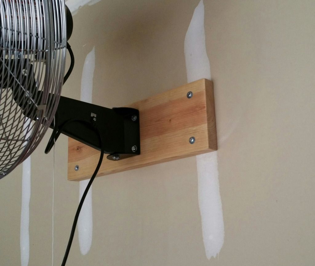 I need to reduce vibration from a wall mounted fan, help me